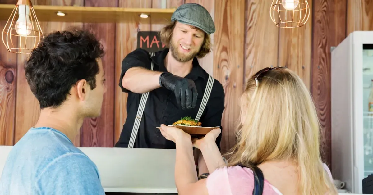 A couple ordering in a local restaurant. 