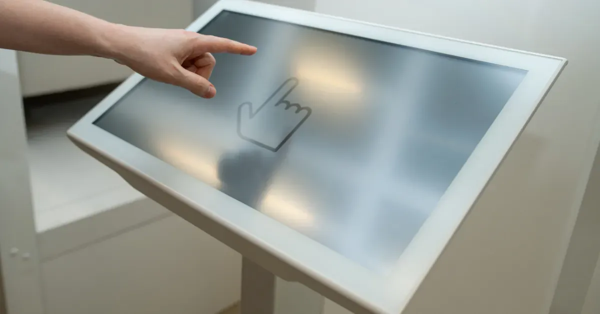 Visitor using a museum information display.